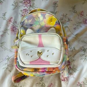 It is a really pretty backpack for kids when they are going on vacation or tips